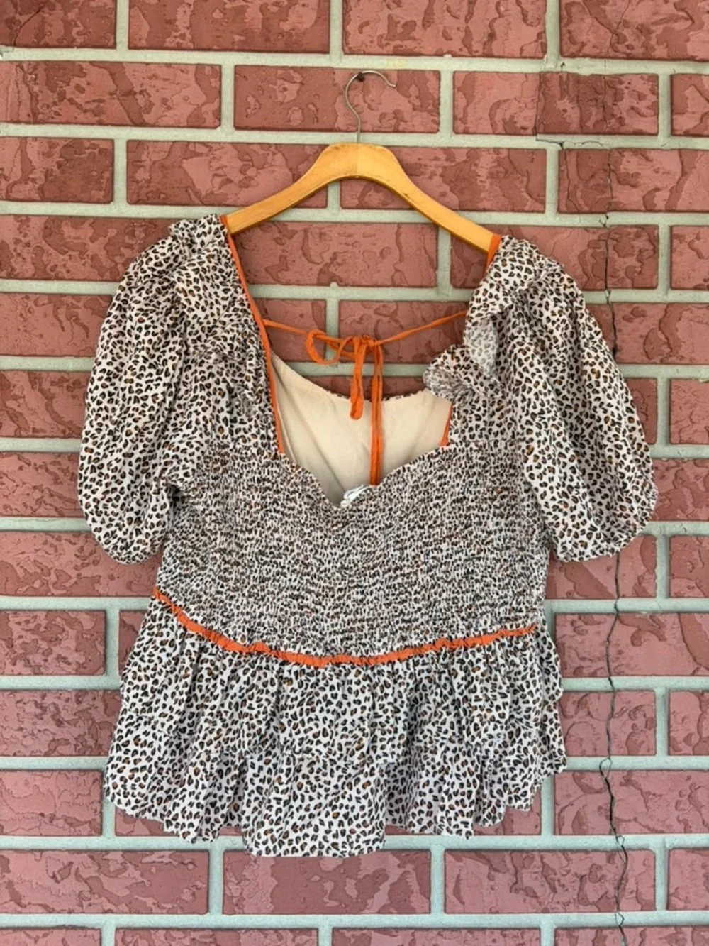eesome Leopard Print Peplum Blouse with Orange Trim